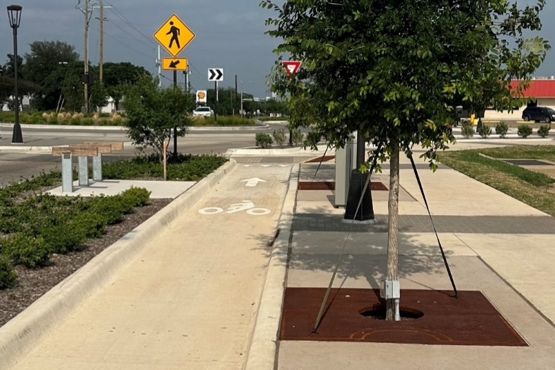 Reconstructed Main Street in Crowley with enhancements such as bicycle lanes, roundabouts, and landscaping