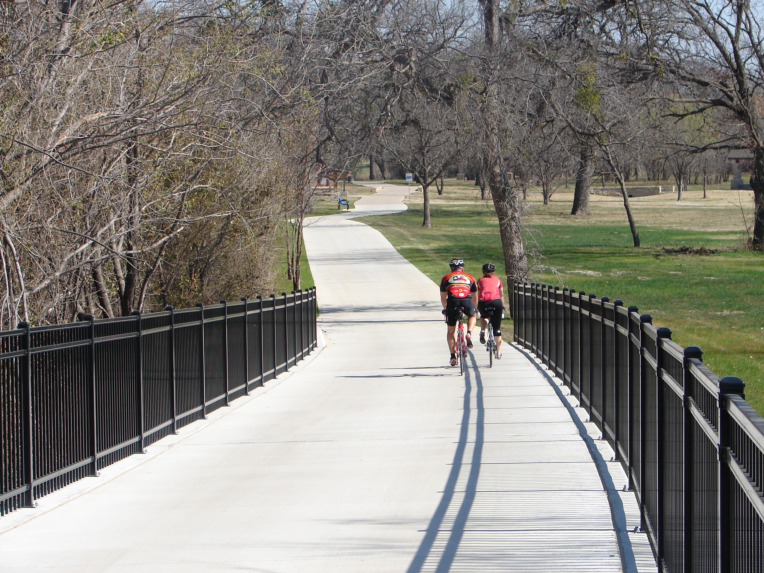 Two people riding a bike