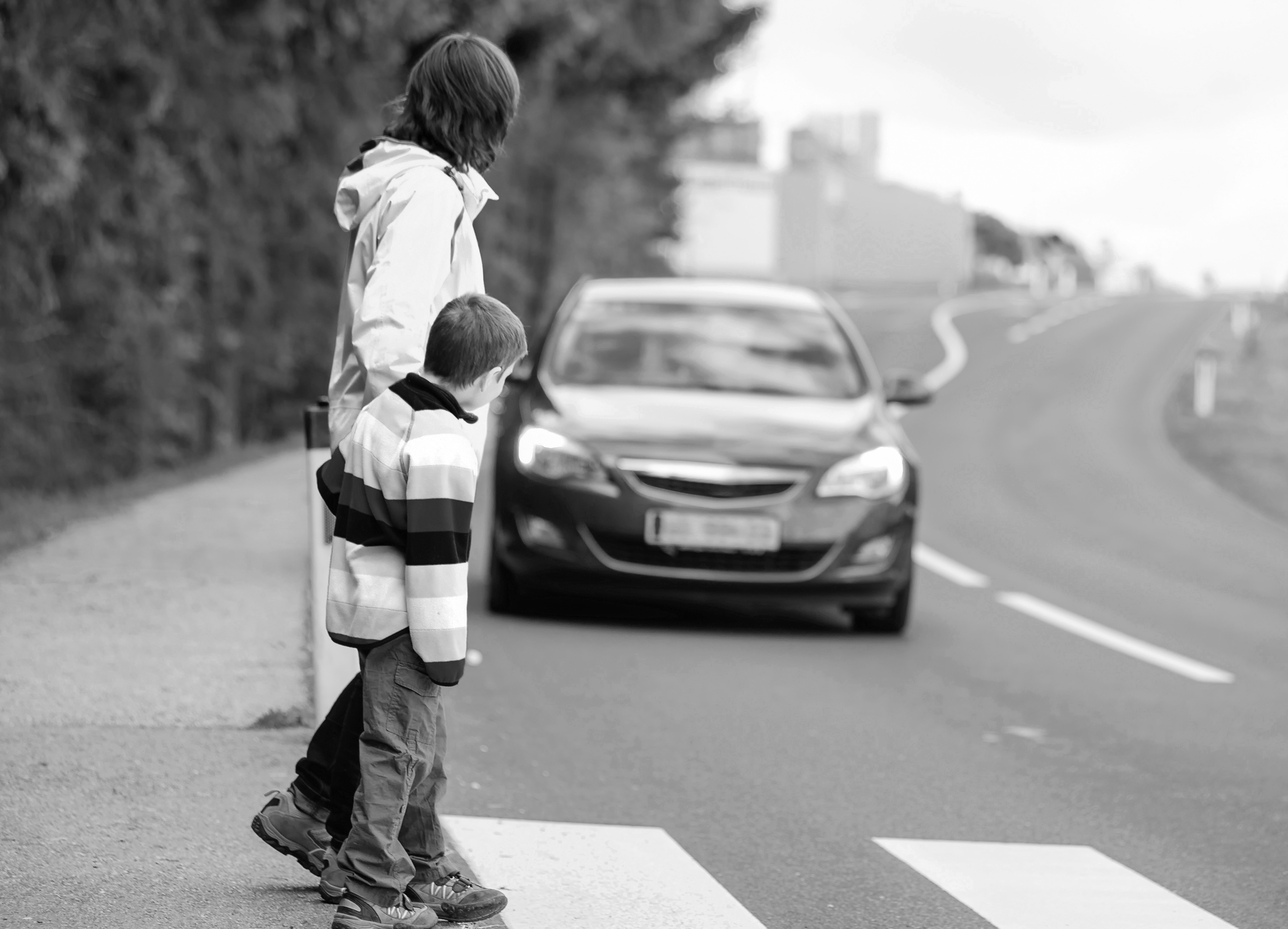 Mom and child crossing safely