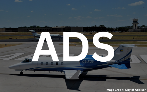 A jet parked on the ramp at Addison Airport